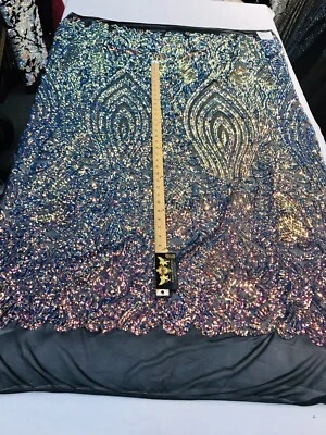 RAINBOW IRIDESCENT SEQUINS ON A 4 STRETCH BLACK MESH-PROM-BY YARD. - Image 1 of 4