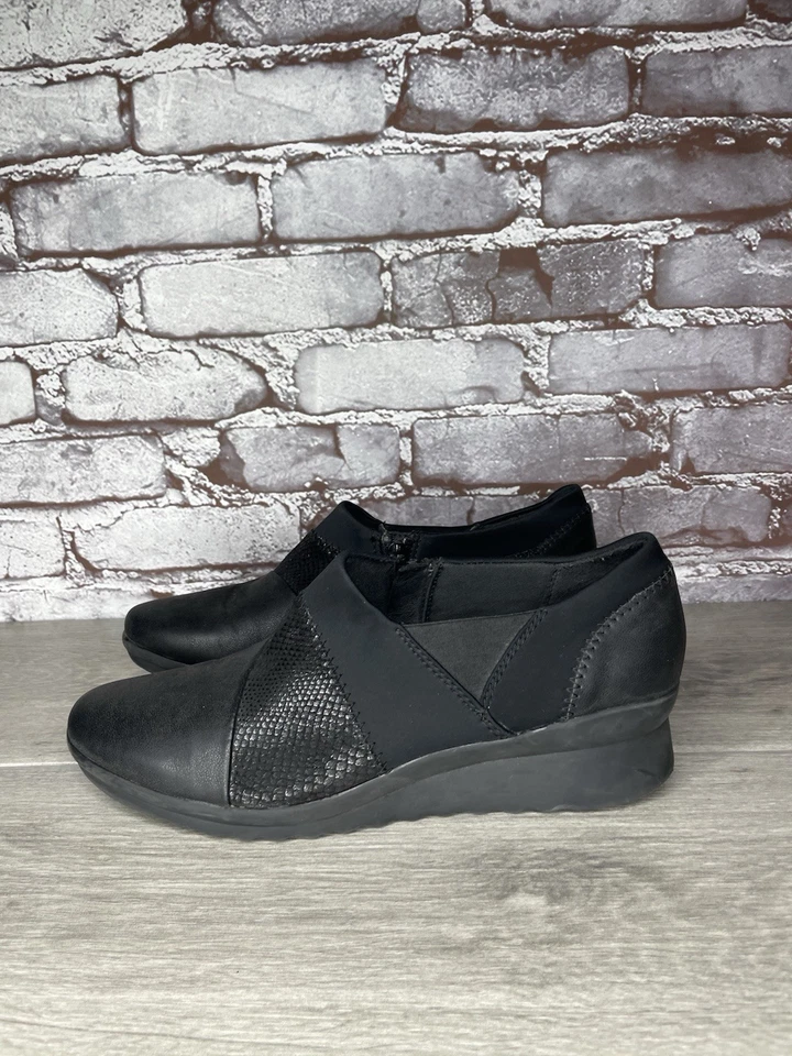 Zapatos de cuña CLARKS Cloudsteppers de cuero negro con cremallera para mujer talla 9M EE. UU./40EU Foto 1 de 4