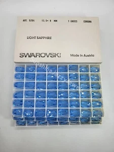 Factory Pack Swarovski Crystal Light Sapphire 13.5x9mm Barrel 5204 Beads; 144pc - Picture 1 of 2
