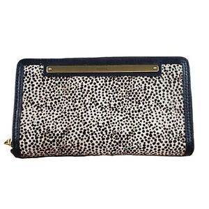 Fossil Liza Slim Bifold Front has an Exotic Animal Print with Black Faux Leather