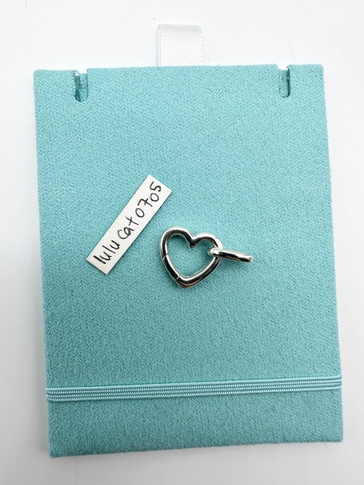 Tiffany & Co. Clasping Heart Link Sterling Silver - Image 1 of 4