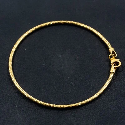 Brazalete redondo de oro amarillo de 18k Foto 1 de 4