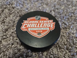 2019 SWITZERLAND NHL GLOBAL CHALLENGE SOUVENIR PUCK PREDATORS SC BERN OFFICIAL - Picture 1 of 4