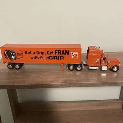 Liberty Classics FRAM Semi Freightliner Tractor Trailer Diecast Coin Bank Orange - Image 1 of 4