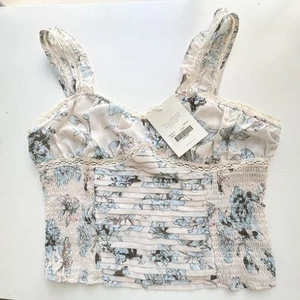 Camiseta sin mangas Bohme plisada calada azul crema floral grande - Imagen 1 de 9