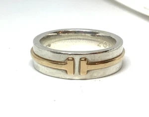 Dos anillos Tiffany & Co. T de plata de ley y oro de 18 k talla 6,25 (grabado en el interior) - Imagen 1 de 9