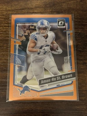 2023 DONRUSS OPTIC AMON-RA ST. BROWN ORANGE PRIZM #001/249 DETROIT LIONS 1/249 - Image 1 of 2