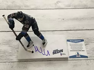 Canucks de Vancouver autografiados firmados por Henrik Sedin McFarlane Beckett BAJO CERTIFICADO DE AUTENTICIDAD a - Imagen 1 de 3