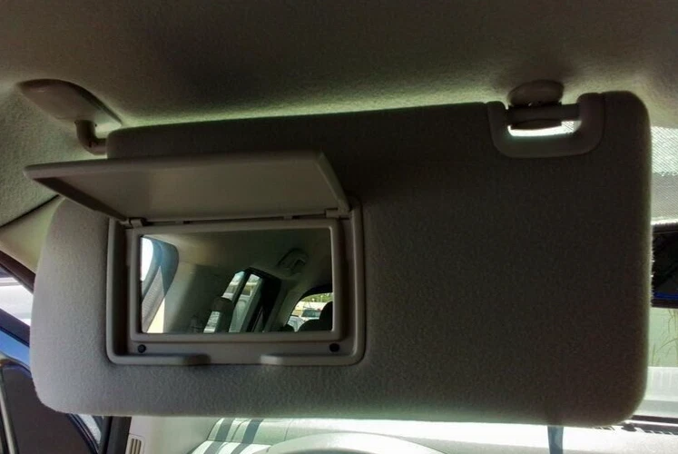 2013-2021 Nissan Frontier, Xterra Driver Side Sun Visor Gray Color OEM - Image 1 of 1