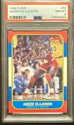 Baloncesto Fleer 1986 Akeem Olajuwon (PSA 8) casi nuevo centrado 🏀 Foto 1 de 2