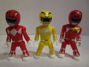 Power Rangers 2 rote & 1 gelbe 2" gegliederte Mini Figuren 3 Stück  - Bild 1 von 3