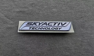 Original Mazda MX-5 / MX5 "SKYACTIV TECHNOLOGY" Emblem Zeichen Logo Heckklappe - Bild 1 von 6