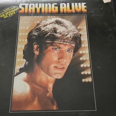 STAYING ALIVE Original Motion Picture Soundtrack 1983 LP SEALED Hype Sticker - Image 1 of 4