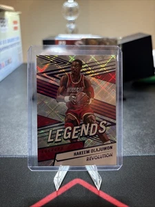 2024-25 Panini Revolution Hakeem Olajuwon Legends # 91/99 🔥 - Picture 1 of 2
