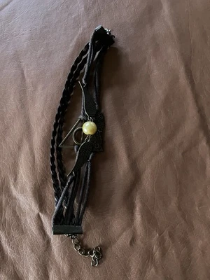 Pulsera de cuero con dijes Harry Potter de las Reliquias de la Muerte Foto 1 de 3