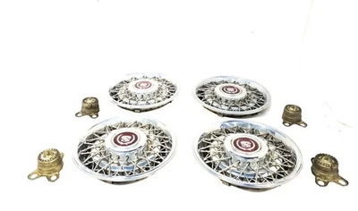 Cadillac Fleetwood 1986 1987 tracción trasera OEM cable cubierta de rueda juego de 4 tiene algunas abolladuras  Foto 1 de 4