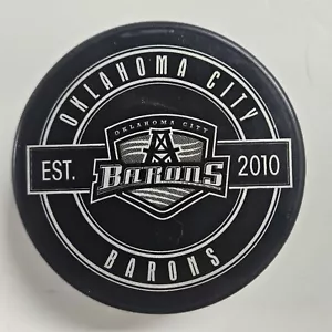 OKLAHOMA CITY BARONS Hockey puck AHL Blazers Edmonton Oilers Bakersfield Condors - Picture 1 of 2