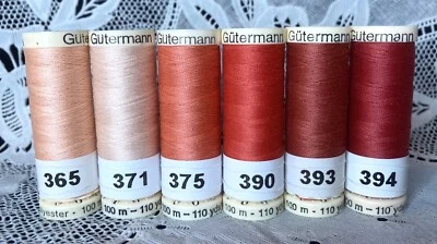 6 NEW red peach colors GUTERMANN 100% polyester sew-all thread 110 yard spools - Image 1 of 4