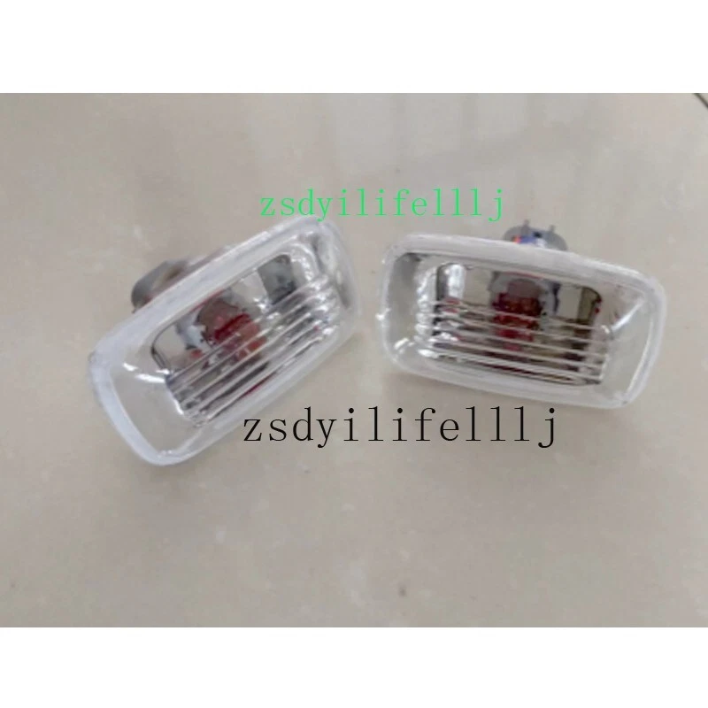 2xPara Toyota Land Cruiser LC100 1998-2007 LH RH Guardabarros Marcador Luz Cubierta Foto 1 de 1