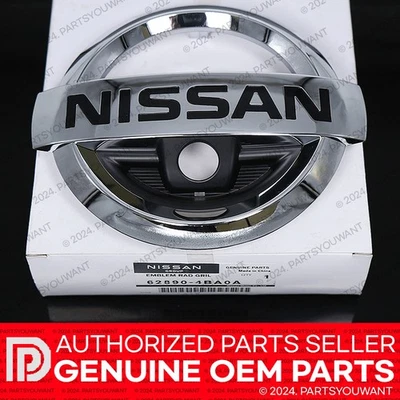 Insignia emblema parrilla delantera original Nissan Murano Rogue OEM 62890-4BA0A 628904BA0A Foto 1 de 4