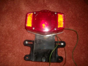 1974-75-76-77-78 HONDA CB750 TAIL LIGHT AND PLATE BRACKET - STANLEY HM-16RC - Picture 1 of 8