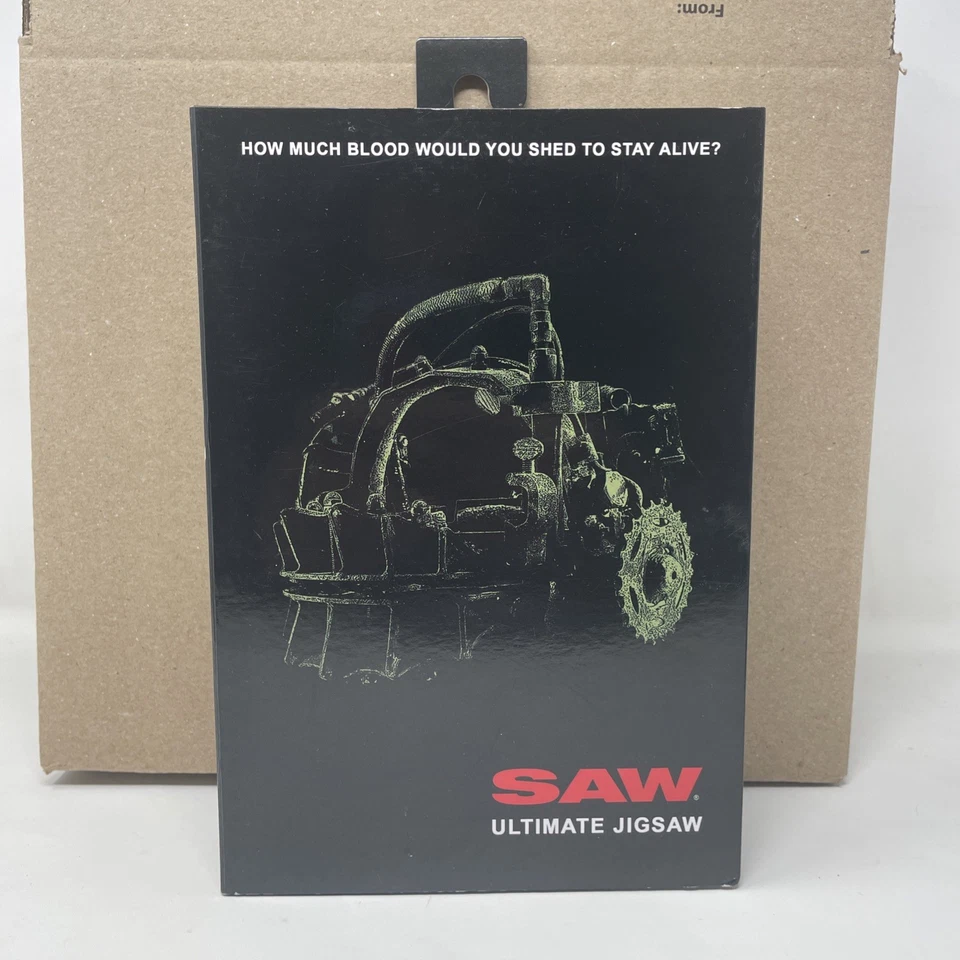 Figura de acción NECA SAW Ultimate Jigsaw 7” lanzamiento 2024 nueva en caja horror coleccionable Foto 1 de 4