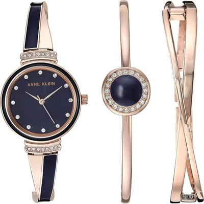 Reloj y brazalete Anne Klein para mujer premium con acento de cristal dorado/azul marino  Foto 1 de 4