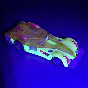 Coche de carreras de juguete vintage 1995 Hot Wheels Road Rocket amarillo brilla en la oscuridad GITD - Imagen 1 de 7