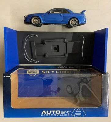 Coche diecast Autoart 1999 escala 1:18 Nissan Skyline R34 GTR - azul Foto 1 de 4