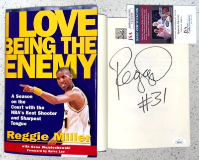 REGGIE MILLER SIGNED HARDCOVER BOOK I LOVE BEING THE ENEMY INDIANA PACERS JSA - Image 1 of 3