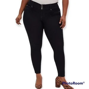 12 Pantalones de mezclilla regulares tórridos Jegging lavado oscuro súper elásticos tiro alto súper ajustados a - Imagen 1 de 9