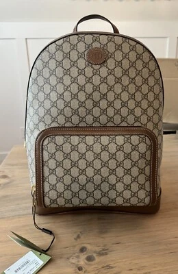 Mochila Gucci com bloqueio G bege ébano marrom GG Supreme 704017FAA0R9795 - Imagem 1 de 4