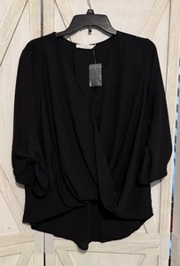 Blusa para mujer nueva con etiquetas exuberante negra transparente cuello en V alta-baja talla mediana - Imagen 1 de 7