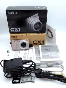 Ricoh CX1 Digitalkamera - 7.1X OpticalZoom - 9,29 M Pixel - OVP + viel Zubehör - Bild 1 von 11