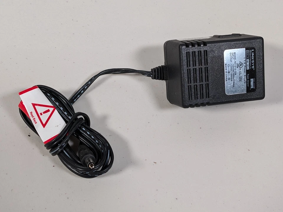 Adaptador de CA Linksys D12-12A Salida 12 V 1200 mA Fuente de alimentación AD 12 1.2 Foto 1 de 3