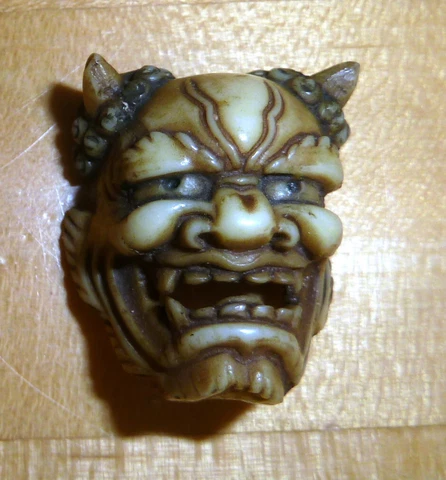 JAPANESE ONI PIERCED CELLULOID MASK NETSUKE in big bk pg 545 WEARABLE ART Cover