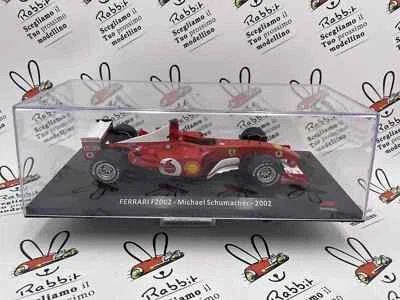 DIE CAST 1/24 " FERRARI F2002 M. SCHUMACHER 2002 " + BOX AUTO DA CORSA - Immagine 1 di 2