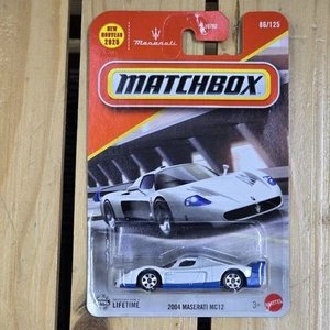 2025 MATCHBOX 2024 MASERATI MC12 WHITE MBX - Picture 1 of 4