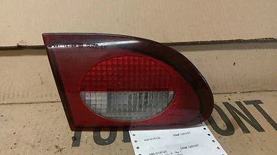 1997 Chevrolet Cavalier Left Lid Mounted Tail Light  - Image 1 of 2