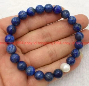 Atemberaubende 8/10mm Blau Lapis Lazuli Runde Edelstein Perlen Armband 19cm - Bild 1 von 3