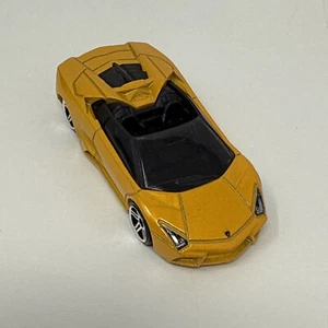 Hot Wheels Bright Yellow Metallic Lamborghini Reventon Roadster lose... - Bild 1 von 5