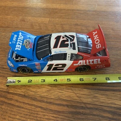 2003 RYAN NEWMAN 1/24 #12 Retro Penske 50th Win Intrepid Racecar Team Caliber - Image 1 of 4