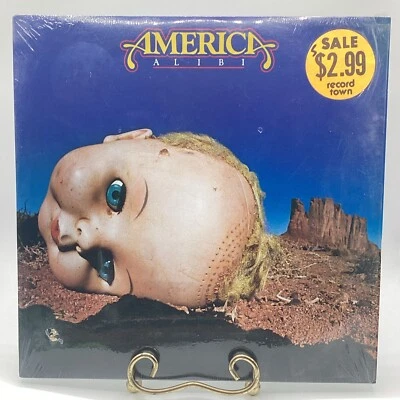 America (2) - Alibi - Capitol Records - SOO-12098 - LP Vinyl Album 1127774148 - Image 1 of 4