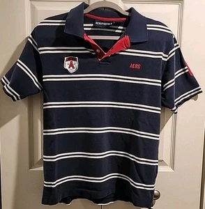 Polo Aeropostale para niño azul marino blanco a rayas manga Sh talla M escudo bordado - Imagen 1 de 12