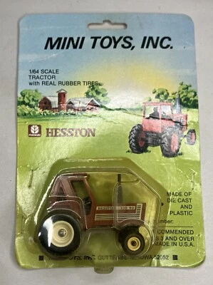 1/64 Mini Toys Hesston 130-90 Tractor With Duals Stock Number 7209 - Image 1 of 4