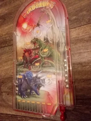 Dinosaurs Schylling 2013 Pinball Manual Juego Portátil Niños Juguete T-Rex 🦖 Foto 1 de 3