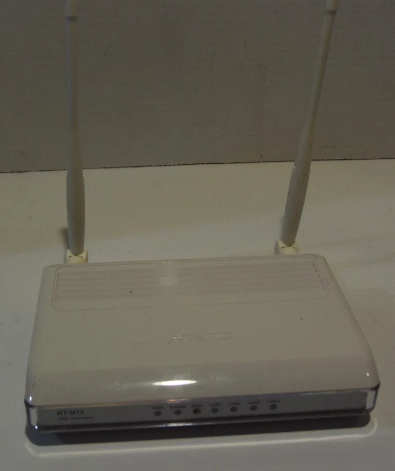 ASUS N300 RT-N12 Wireless 3-in-1 Router/AP/Range Extender for Large Environment - Image 1 of 4