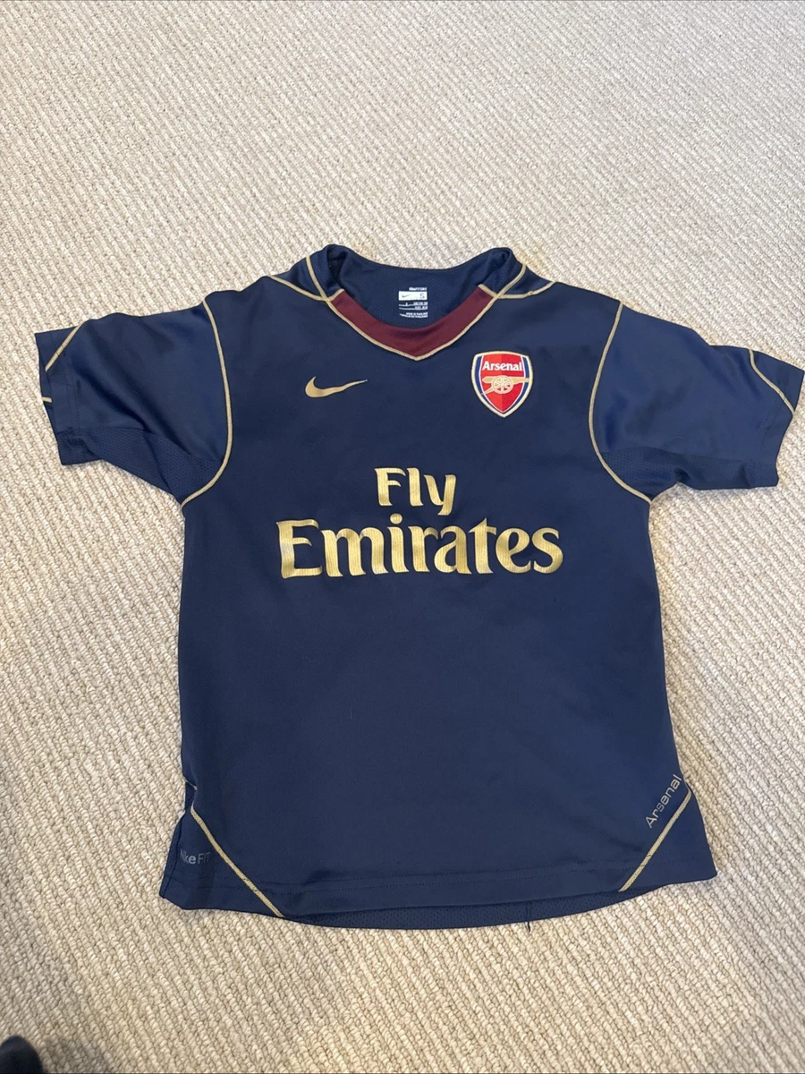 Preços baixos em Nike Arsenal Gold International Club fã de