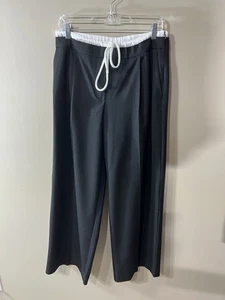 Pantalones de vestir Zara grandes negros pierna ancha tiro alto blanco satinado cordón cintura - Imagen 1 de 12
