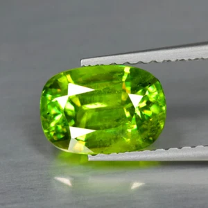 1.53Ct Custom Oval Cut_Sizzling Unheated Titanite Semi Chrome Sphene - Picture 1 of 1